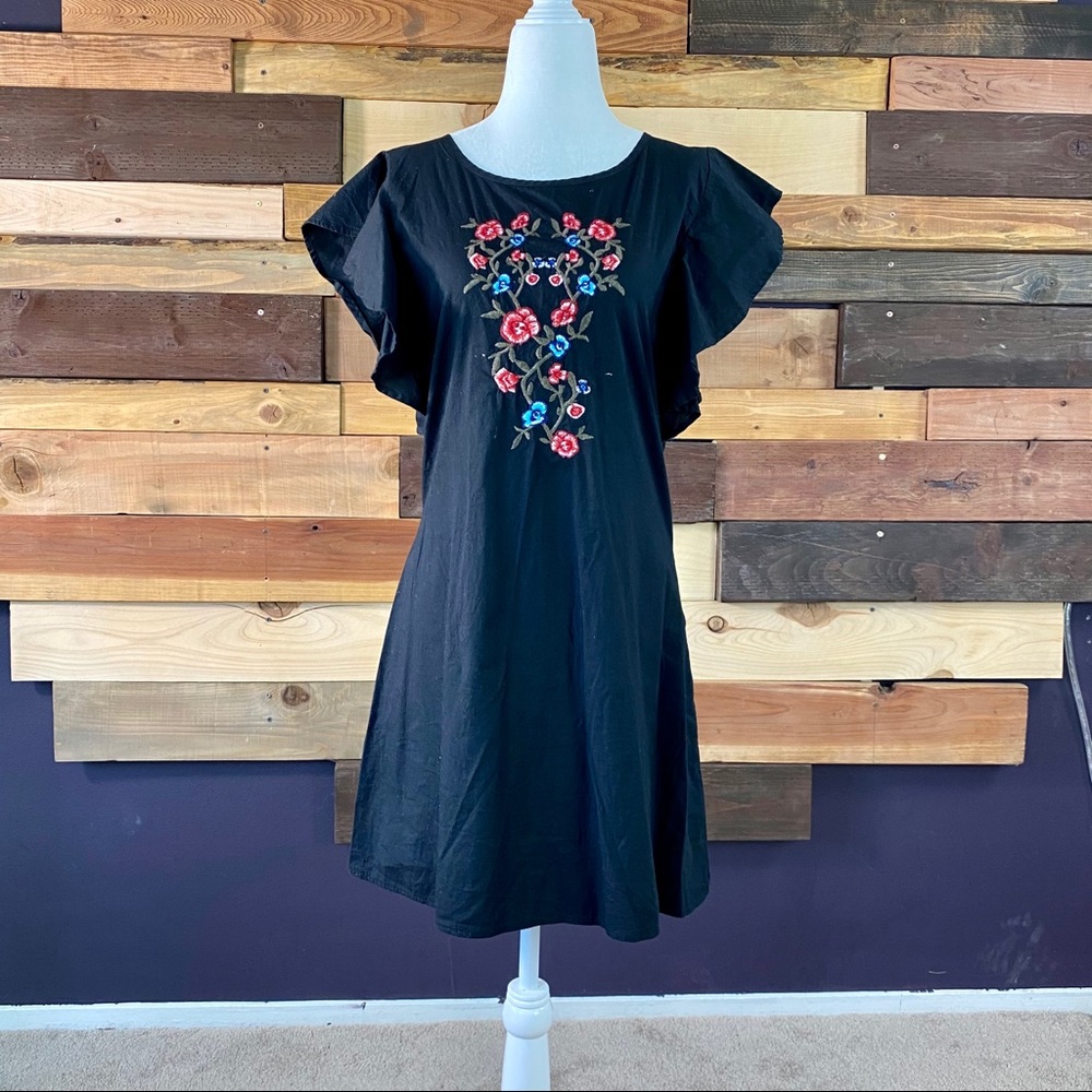Black dress with ruffle sleeves